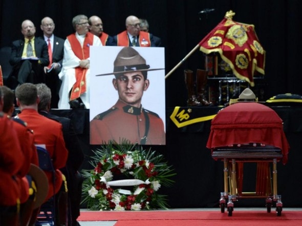6.12.14 - Canine Partner of Slain Mountie Cries at Funeral3