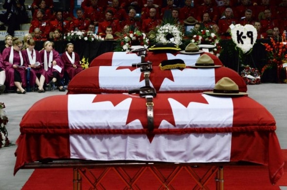 6.12.14 - Canine Partner of Slain Mountie Cries at Funeral4
