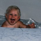 happy baby in bathtub