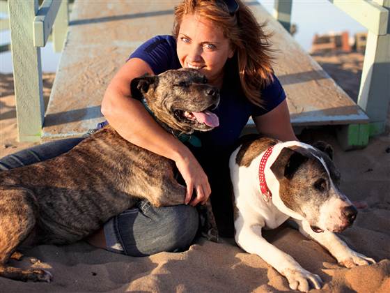 Lori Fusaro with her loves, Gabby and Sunny.  "When you bring dogs out of a shelter, they start realizing that they’re safe and they’re being loved by a new family," Fusaro said. "They come out of their shell and want to experience life."