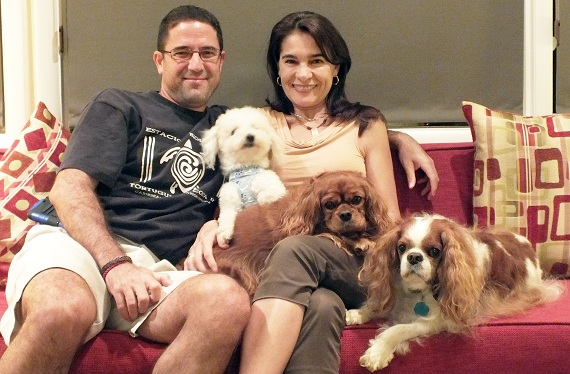 Journalist Rodrigo Villarreal with his wife and their fur-babies.