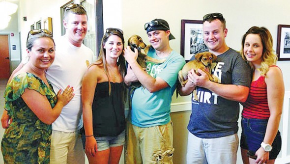 Some of the adopters, from left:  Alisha Keezer, Jon Bellemare, Marlaina Saharic, Tucker Harding, and Jon and Becky Malcolmson.