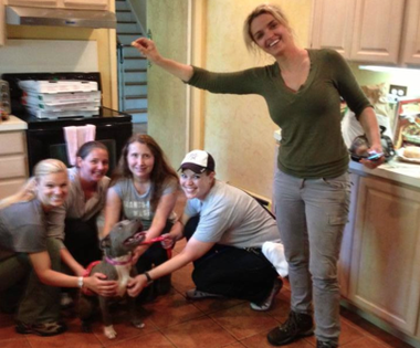 Erin Earley-Hamilton with Misty's rescuers, who found her after she ran away in 2013.