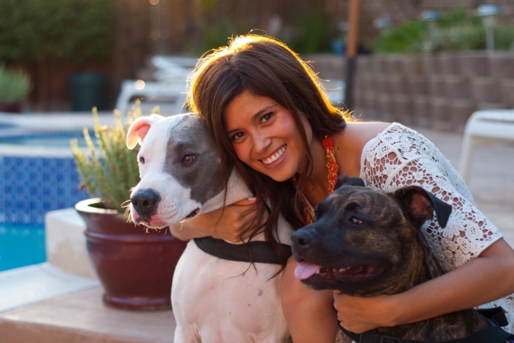 Smiling pit bull owner