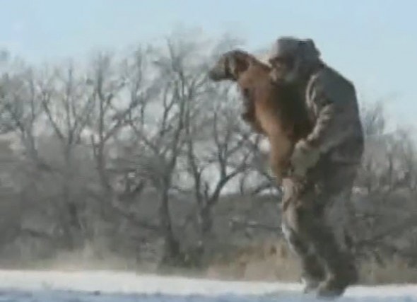 Dog being rescued by Nebraska's State Patrol. Photo Credit: Nebraska State Patrol