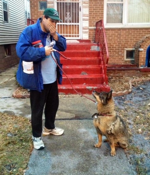 Peter and Sheba reunited after One Tail at a Time paid the dog's redemption fee. Photo Credit: OTAT