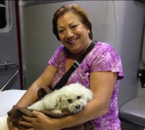Elaine Caralias and Susie at the Vet. Photo Credit: Fort Lauderdale Fire Rescue