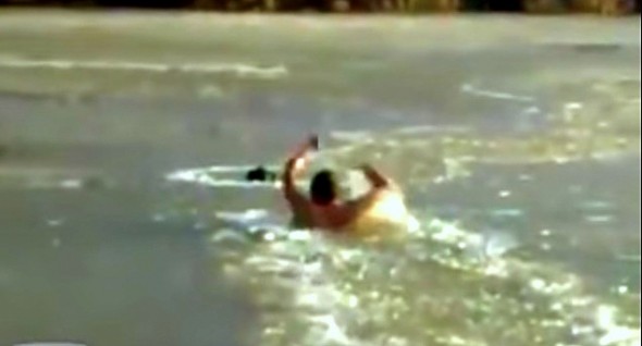 9.25.14 - Man Punches His Way Through Ice to Save Drowning Dog1
