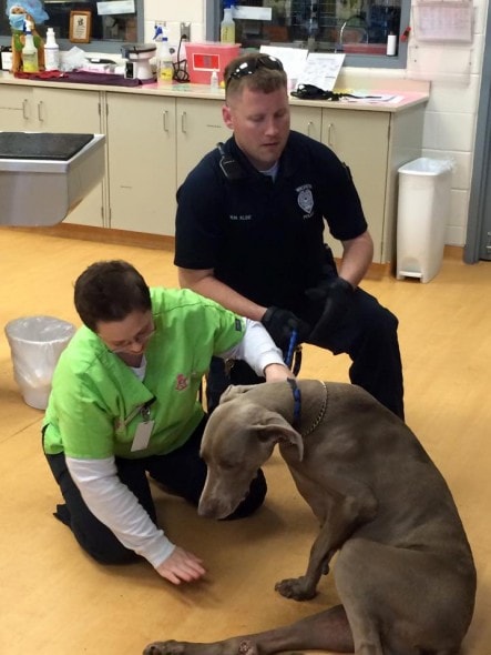 Officer Neil Kline, Bubba and vets from Kansas Humane Society. Photo Credit: Wichita Animal Shelter