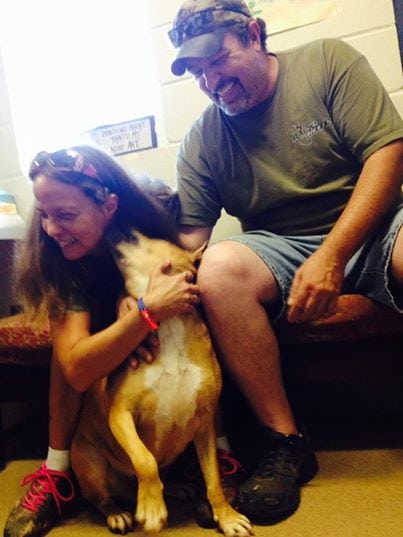 Tara with her adoptive parents. Humane Society of Forsyth County (HSFC)