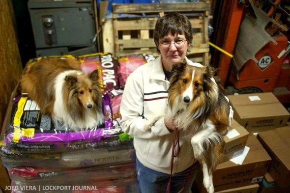 Charlotte Craig, with her Shelties Maggie and Tanner, is the coordinator of the pet food pantry program