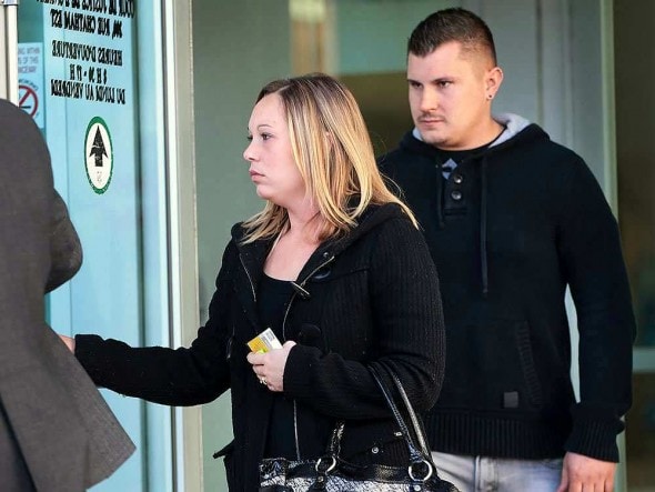 Jessica Hems and Adam Esipu exiting the courthouse.