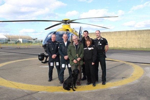 Mr. Kay and Holly Blue with their rescuers.