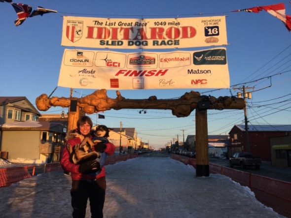 Zeke at finish with friend Laura nome-3-19-2016 Kailyn Davis photo
