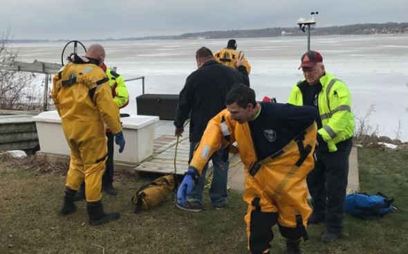 Firefighters gear up to save the dog. Photo: White Lake Fire Authority 